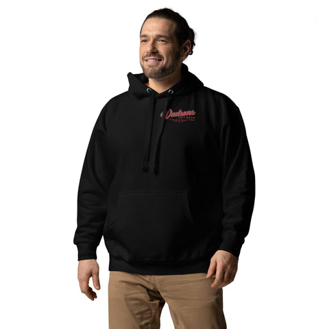 Adult male, wearing brown pants, with a black hoodie with a red logo saying Wadson's Hot Rod shop, with red pinstriping under